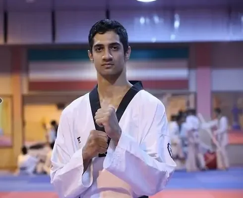 عکس امیرمحمد اشرافی تکواندوکار